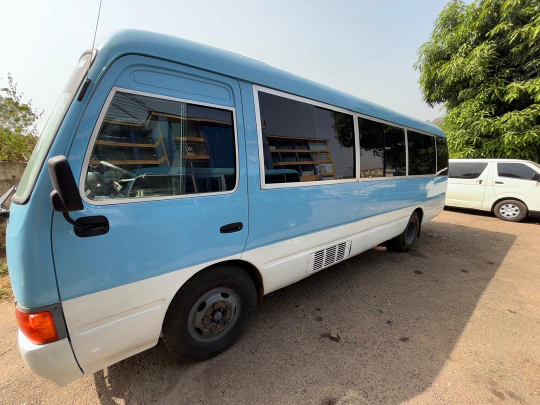 Chiomaxx Xpress air-conditioned Coaster charter bus in Abuja